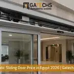 Double-leaf automatic sliding door operator with safety sensors installed on a commercial entrance in Egypt
