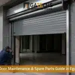 Service engineer performing shutter door maintenance on an automatic commercial operator in Egypt